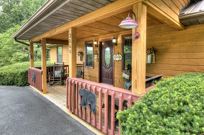 Sit on the front porch and enjoy the serenity from your Wears Valley Cabin Rentals