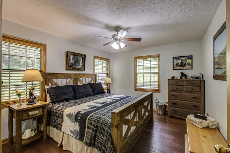 Bedroom 1 on the right offers a King Bed and a perfect setting for the grandprents.